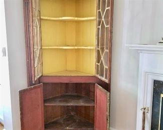 Corner cabinet.  Inside painted yellow.