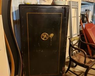 Fun and unsual wooden safe with a kitchenette and office inside