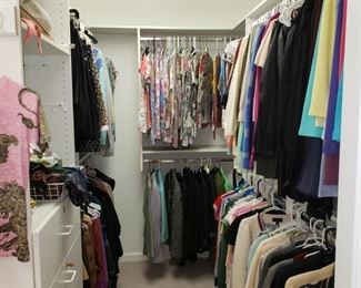 Closet filled with ladies clothing