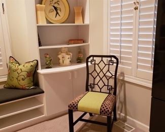 Two upholstered black painted Oriental style side chairs