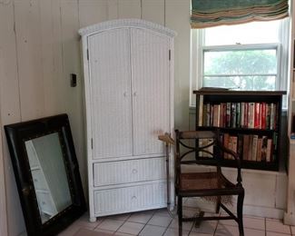 White wicker wardrobe and the armchair of the matching Hitchcock side chairs