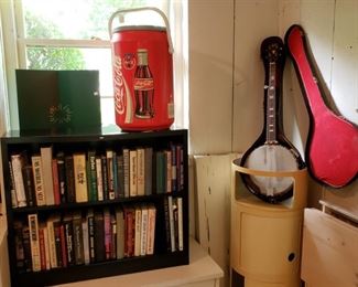 Coke Cola cooler and a banjo in need of TLC