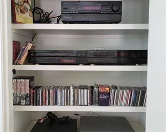 Denon receiver, CD changer and cassette tape. Apex and Magnovox VHS and CD's