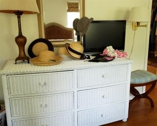 Wicker dresser, there is also a pair of nightstands and an armoire
