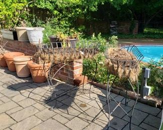 Pair of metal planters and other planters