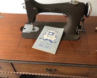 Vintage Macy's sewing machine and stand