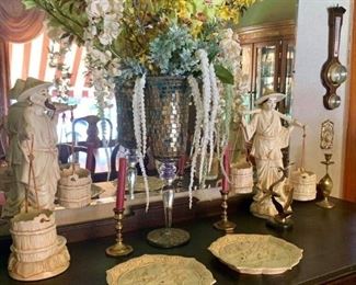 Asian style statues. floral displays