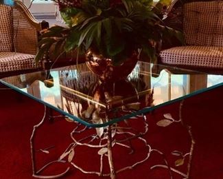 Beautiful square glass top table with metal legs.
