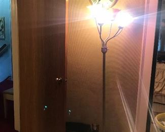 Adjustable floor lamp and clock
