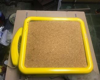 Retro yellow wall phone with built in cork board