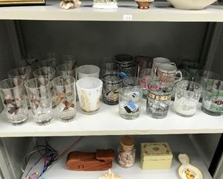 Fun glassware, including 12 wildfowl glasses by Lynn Bogue Hunt.