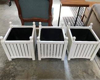 Three DMC planter boxes.