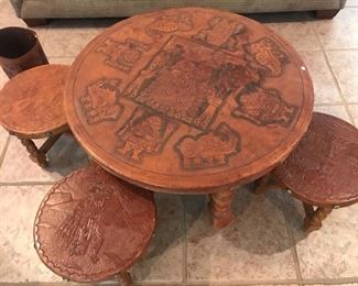Circa 1956 Hand tooled leather child's table and stools- beautiful condition