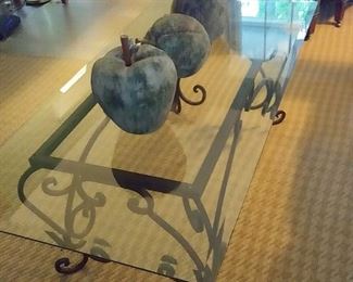 glass and iron coffee table with large fruit