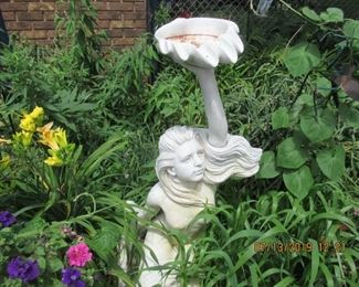 $500.00 MERMAID STATUE,( HEAVY) LADY IN A SITTING POSITION SIGNED, ASKING $500.00