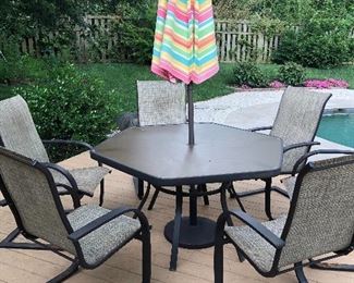 Outside dining table and umbrella with stand