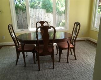Dining room table and four chairs. 