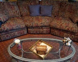 Curved sofa, glass coffee table