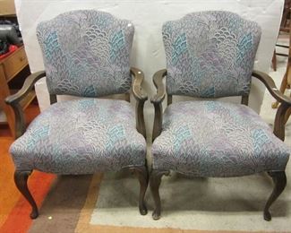 Upholstered pair of arm chairs