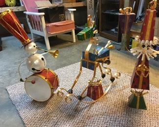 Metal Christmas figures from Twist and Turns.  Snowman on drum, rocking horse, whimsical Santa. 