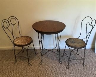 Charming antique ice cream table and 2 chairs. 