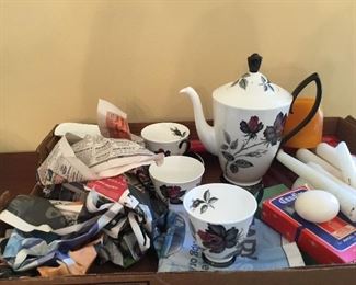 Cute rose tea set, cups, saucers and teapot. 