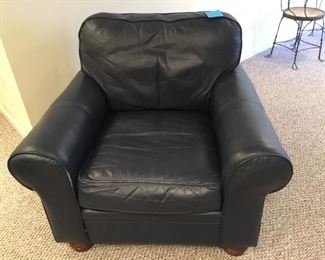 Navy blue leather chair. Great condition. With ottoman. 