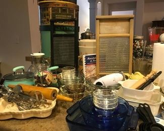 Marked Anchor Hocking blue glass serving/cooking ware, vintage washboards, Chantal bakeware, rolling pins, custard cups, (green pot not for sale)