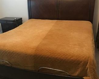 Tempurpedic Mattress on adjustable base king-sized bed, matching side table