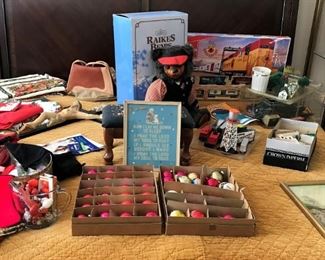 Vintage Christmas ornaments, Raikes Bear in box, Vintage holiday linens, Vintage cross stitch of child's bedtime prayer, Ladies purse w/tag, Religious picture, vintage Atlas trains pieces, 1996 Shopright Express train set in box,