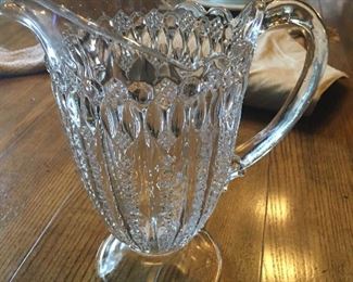 Tons of Antique crystal bowls platters, trays, pitchers, vases, candle holders, etc.