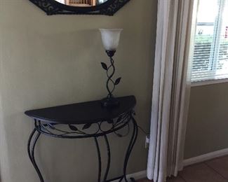 Nice table for your keys or mail with a matching mirror and lamp to complete this ensemble.