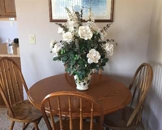 Great table and chairs for a small area.  Four chairs.  Good condition