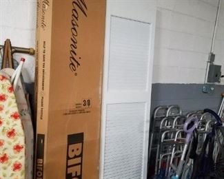Assorted new louvered & solid white bi fold doors