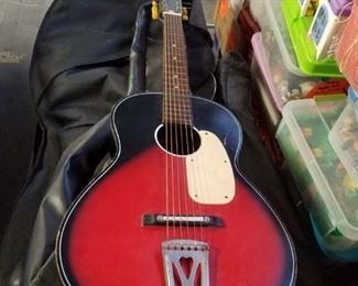 Vintage wooden acoustic guitars with case