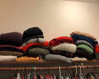 womens clothes. bunches of winter sweaters