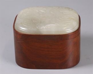 large Chinese white jade carving inlaid in wooden box, possibly 19th c.