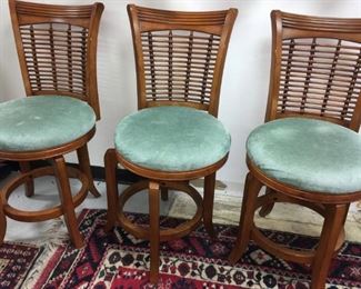 3 bar stools, upholstered seats swivel