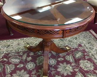 Beautiful round wood carved table with glass top 