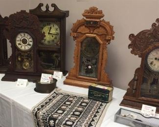 NOTE: The 4 clocks on the left were among the items stolen. Clocks of various vintages, styles, uses, including Howard Miller key wind and set carriage; Ingraham dial clock with barometer calendar made in America; Ingraham Dew Drop calendar wall clock; Sterling & Noble quartz; Gibraltar Ship clocks; anniversary; mantel clocks by Sessions, Ingraham, New Haven, Sunbeam; vintage electric; German Regulator wall; Korean clocks, Verichron, American Mission; grandfather clocks; antique kitchen