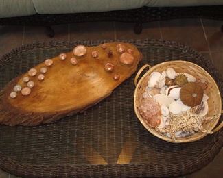 Screened Porch: Tiny mushrooms "grow" on a slice of wood. The basket is filled with interesting shells.
