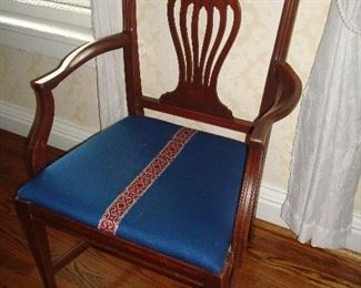 Dining Room: This is one of the six vintage mahogany chairs priced with the dining table. There is one arm chair and five side chairs. Each has a slip seat so they are easy to re-upholster.