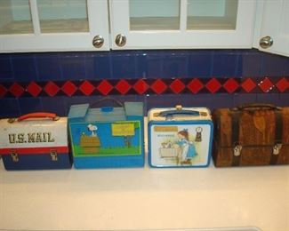 Family Room: Lunch time! Vintage lunch boxes: U.S. Mail by Aladdin Industries; Snoopy and Woodstock; Holly Hobbie; and a Byzantine themed decoupaged box.