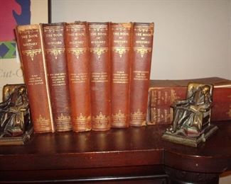 Family Room: This is the antique 8-volume set of "The Book of History...a History of All Nations." The vintage (circa 1920) bookends depict a man sleeping after reading.