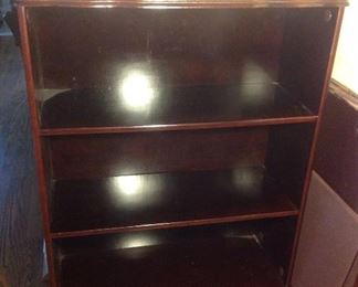 Dining Room: This is one of two bookcases that is great for books or collectibles. Each is priced separately and measures 31" wide x 42" tall x 12" deep.