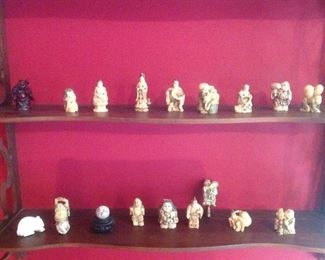 Family Room: These Japanese Netsukes are made of a composition material and will be displayed in a case.