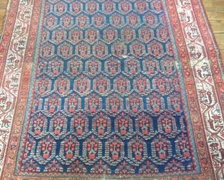 Sun Room- Office: This antique hand knotted rug measures 4' 5" x 6' 7." It has some wear but is still a desirable rug for many collectors. It was just returned today from Woodard Rug Cleaning.