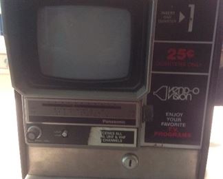 Family Room: I have never seen one of these! It is a 1960's coin-operated television by PANASONIC called a VEND-O-VISION. It takes quarters and there are some in it--can't get them out though as there is no key. Apparently, they were often staged in bus stations for the people who were waiting for a bus. I am sure you can figure out something though. It is a novelty! It is counter-size--about 12" x 12" total but the screen is about 5."