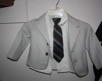 Cute toddler jacket, tie, and white shirt.  Thtere's also a belt somewhere in the house.