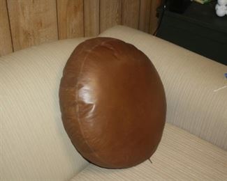 Nice, round leather pillow.  perfect for an afternoon nap.